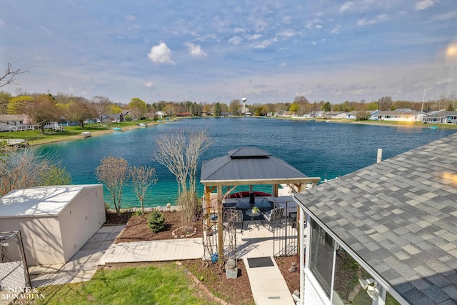 view of dock with a water view and a gazebo