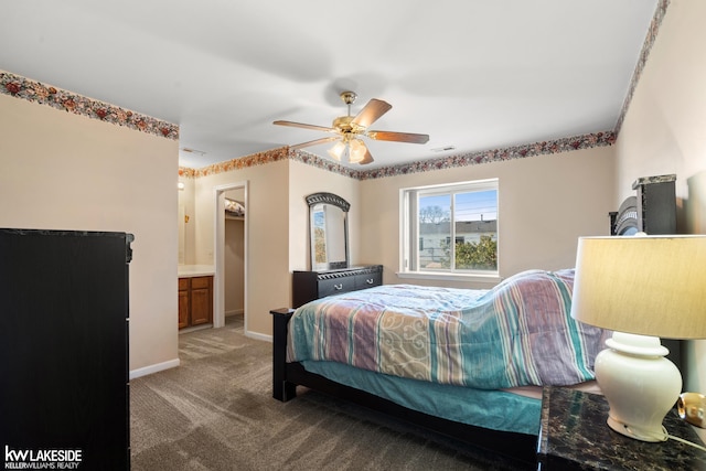 carpeted bedroom with baseboards, a ceiling fan, and a spacious closet