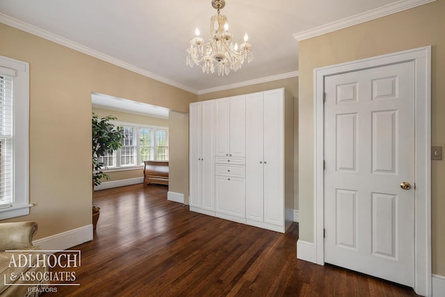 unfurnished bedroom featuring an inviting chandelier, baseboards, crown molding, and dark wood-style floors