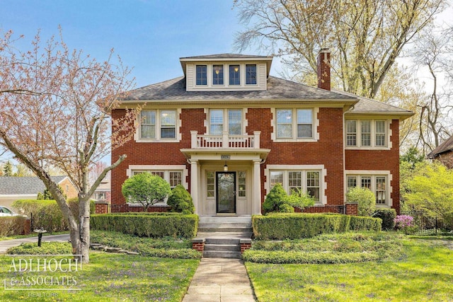 view of front of home with brick siding and a chimney