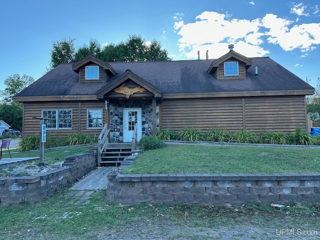 log home with a front yard