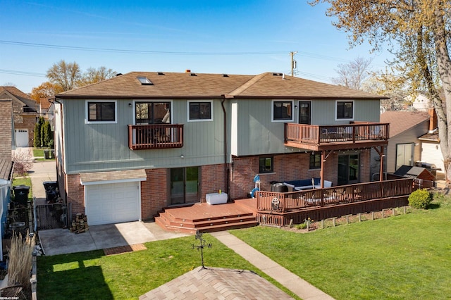 rear view of property featuring brick siding, a garage, a balcony, a yard, and driveway