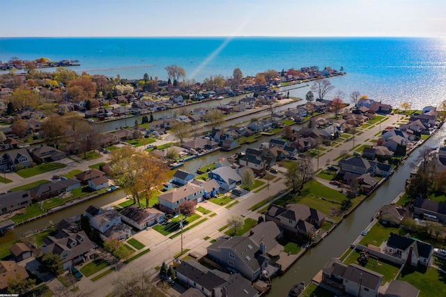 aerial view with a water view and a residential view