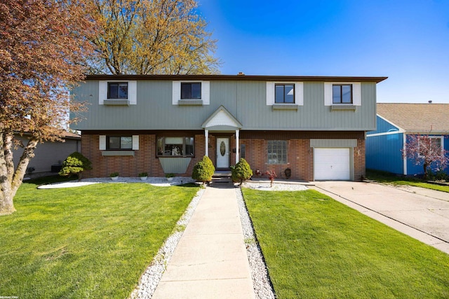 view of front of house featuring brick siding, a front lawn, an attached garage, and concrete driveway