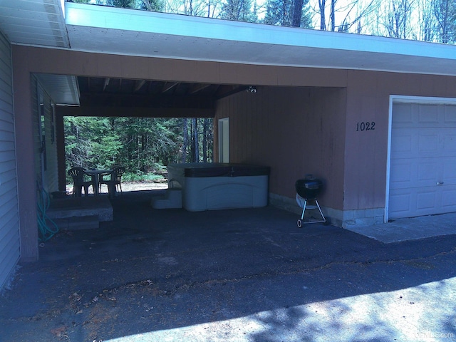 exterior space with a carport