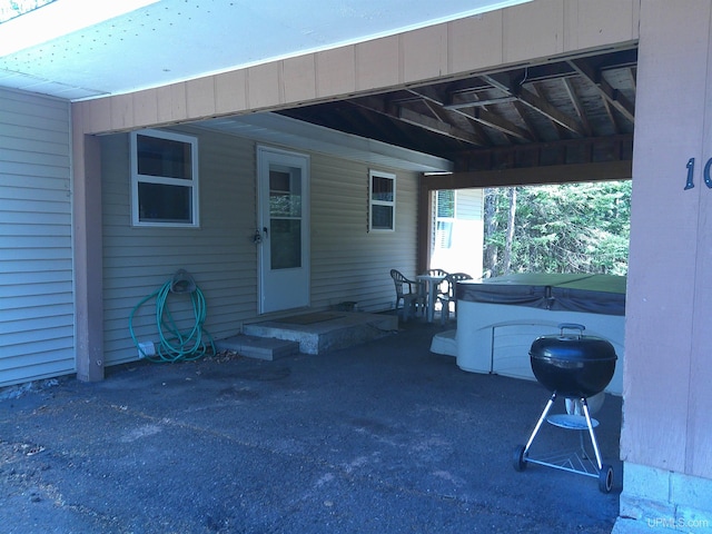 view of patio featuring a hot tub and area for grilling