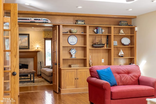 sitting room featuring recessed lighting and wood finished floors
