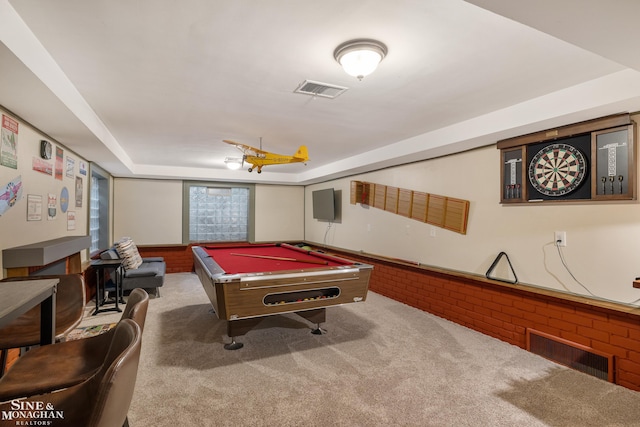 game room with carpet floors, pool table, a tray ceiling, and visible vents
