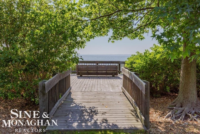 surrounding community featuring a water view