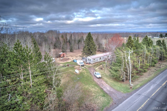 aerial view with a wooded view
