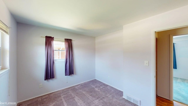 empty room featuring visible vents
