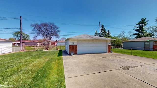 detached garage featuring fence