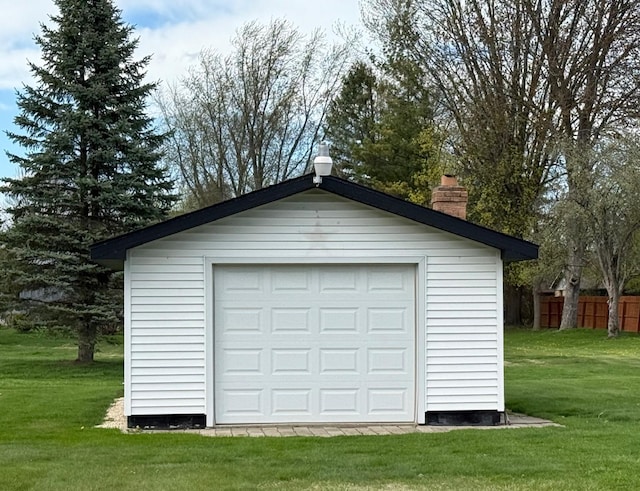 detached garage with fence