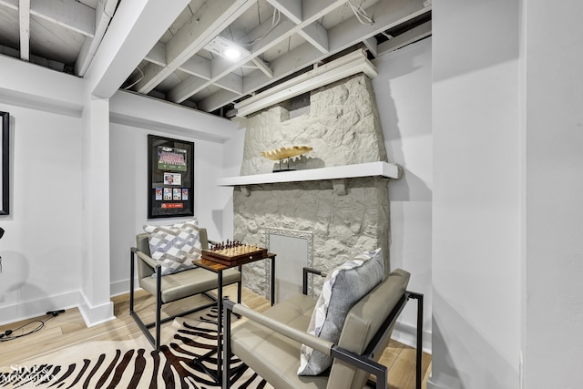 office space with baseboards and wood finished floors