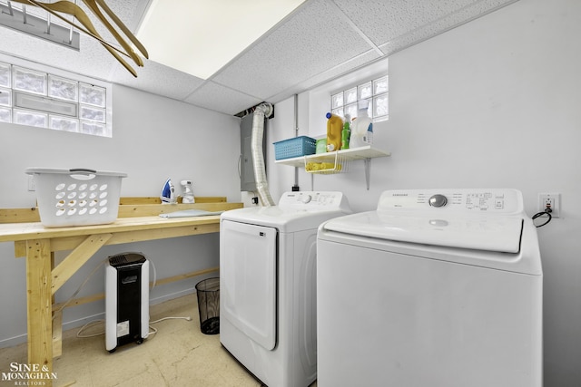 washroom featuring laundry area and washer and clothes dryer