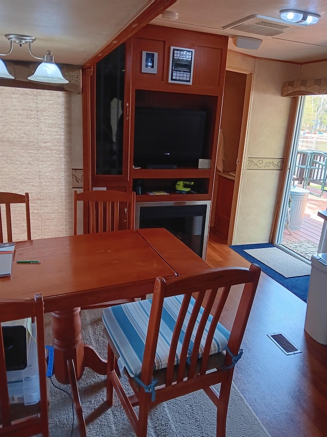 dining space featuring visible vents