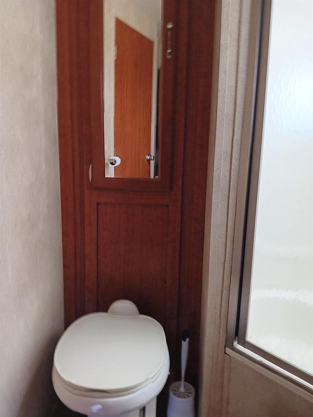 bathroom with a textured wall
