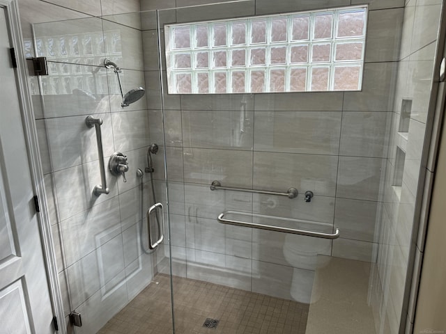 bathroom with a stall shower
