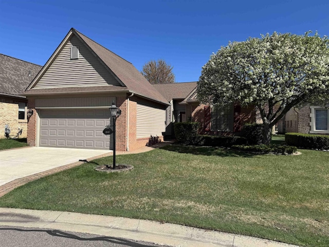 ranch-style house with an attached garage, a front yard, driveway, and brick siding
