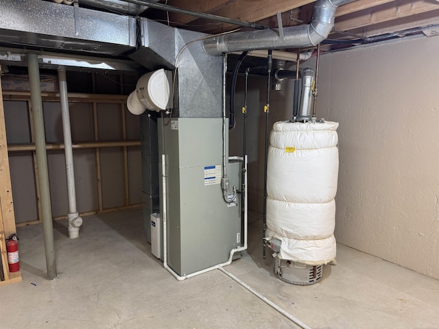 utility room with heating unit