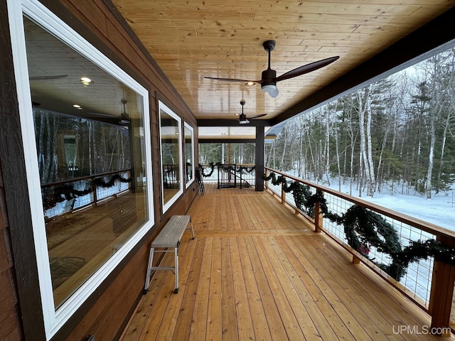 exterior space featuring ceiling fan