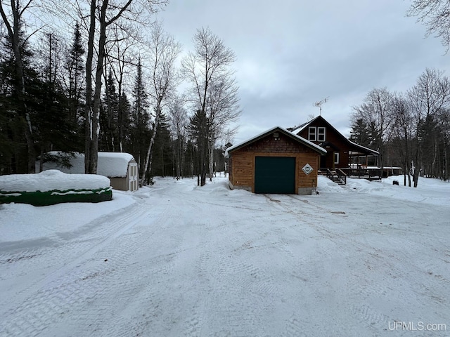 exterior space with an outdoor structure and a shed
