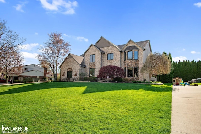 view of front of house with a front lawn