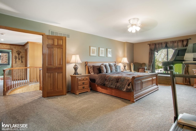 bedroom with carpet floors and visible vents