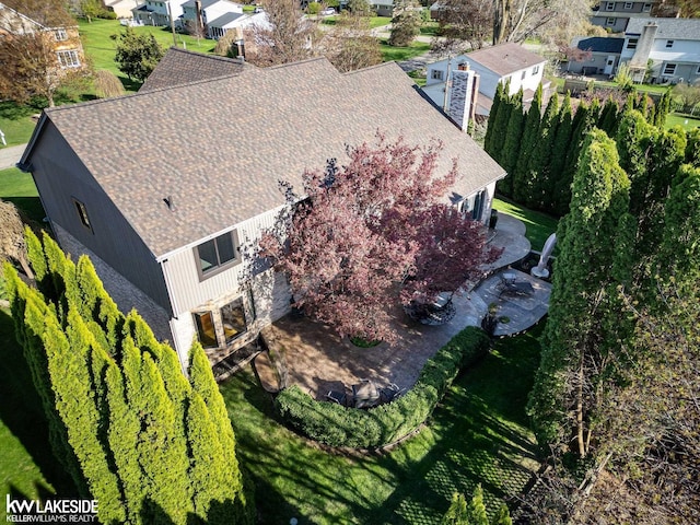 drone / aerial view with a residential view