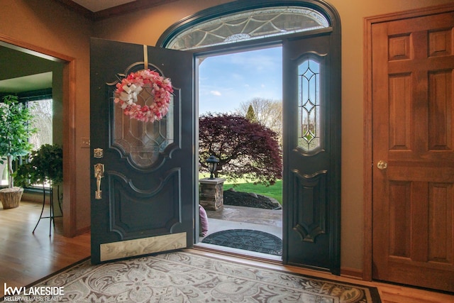 foyer entrance with wood finished floors
