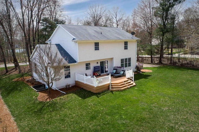 rear view of property with an outdoor hangout area, roof with shingles, a yard, and a deck