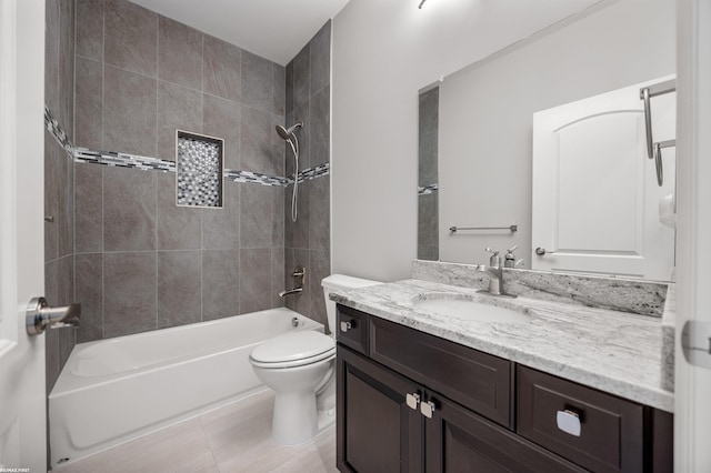 full bath featuring toilet, tile patterned floors, tub / shower combination, and vanity