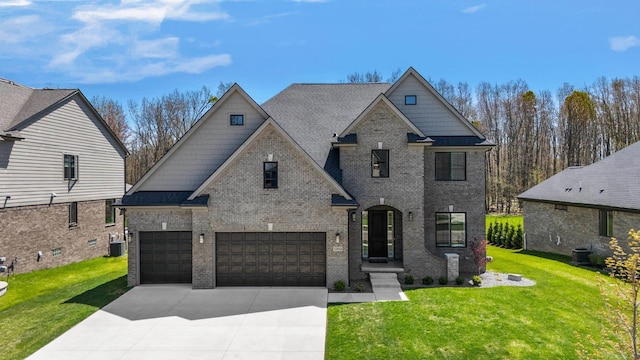view of front facade featuring brick siding, driveway, central AC unit, and a front lawn
