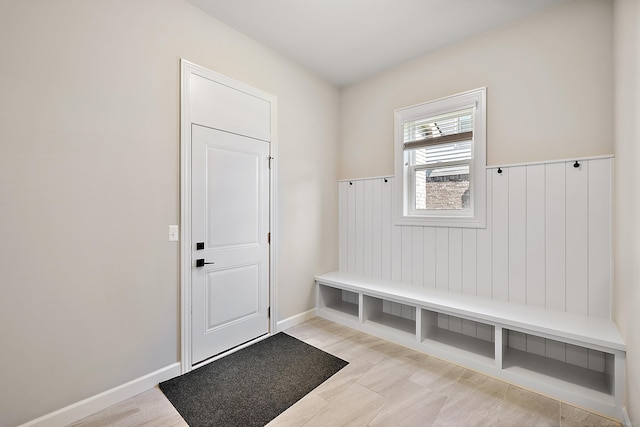 mudroom featuring a wainscoted wall