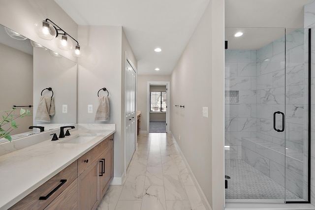 full bathroom featuring vanity, marble finish floor, baseboards, recessed lighting, and a shower stall