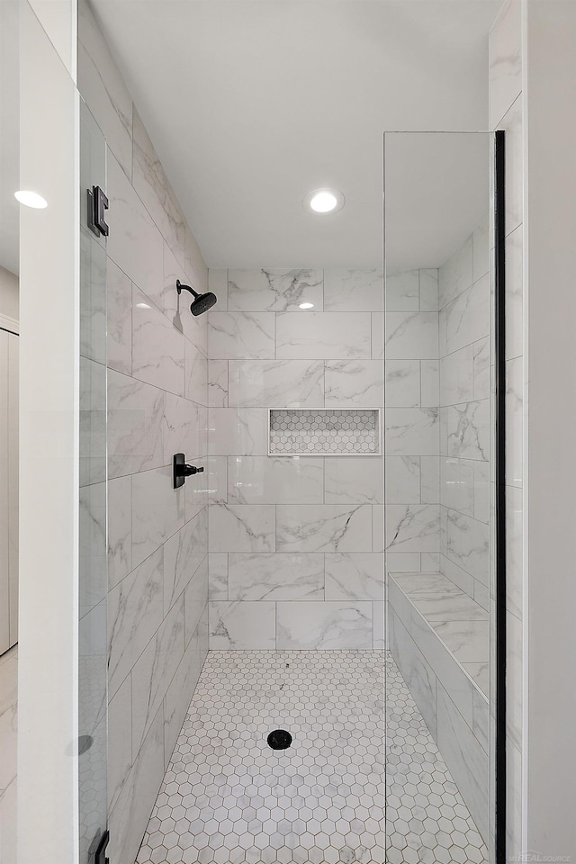 full bathroom featuring a stall shower and recessed lighting
