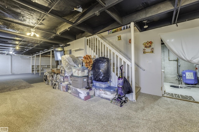 8765 Winn Rd, Brown City, MI 48416 - unfinished basement with carpet floors and stairs