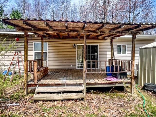 1300 Birch Rd, Harrison, MI 48625 - deck with a pergola