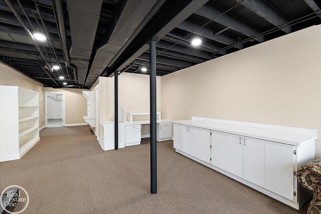 finished below grade area featuring carpet floors