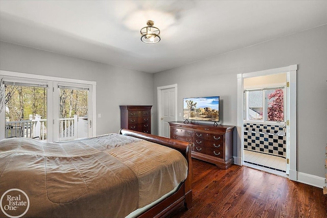 bedroom with baseboards, access to outside, and wood finished floors