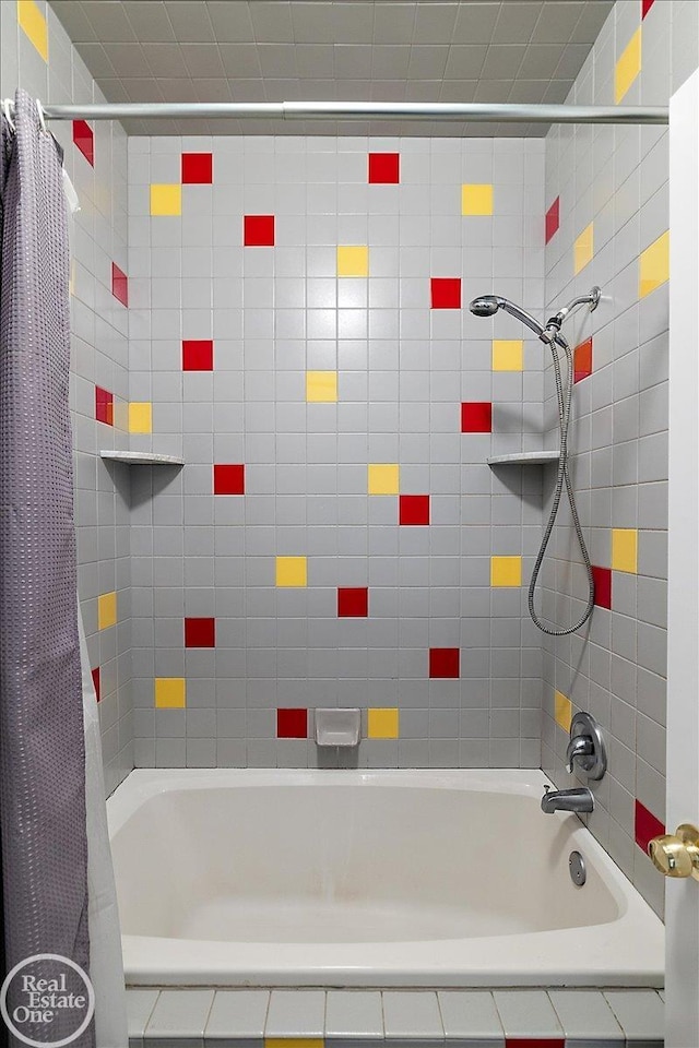 full bath with tiled shower / bath