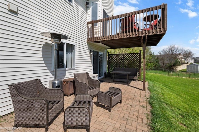 view of patio with a hot tub and outdoor lounge area