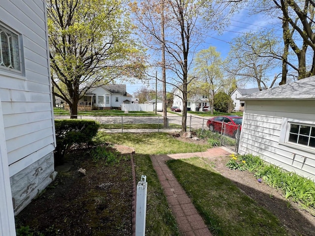 706 W Indiana St, Bay City, MI 48706 - view of yard featuring fence and a residential view