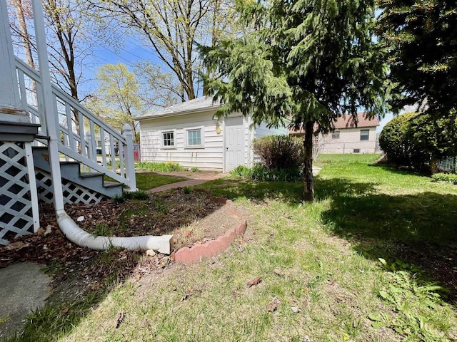 706 W Indiana St, Bay City, MI 48706 - view of yard with stairs and fence