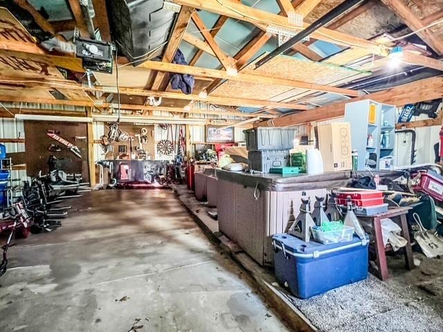 interior space featuring a workshop area and a garage door opener