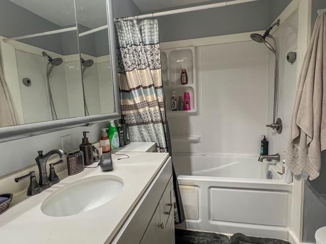 bathroom with vanity and shower / bath combination with curtain