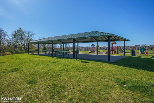 surrounding community featuring a lawn, a gazebo, and playground community