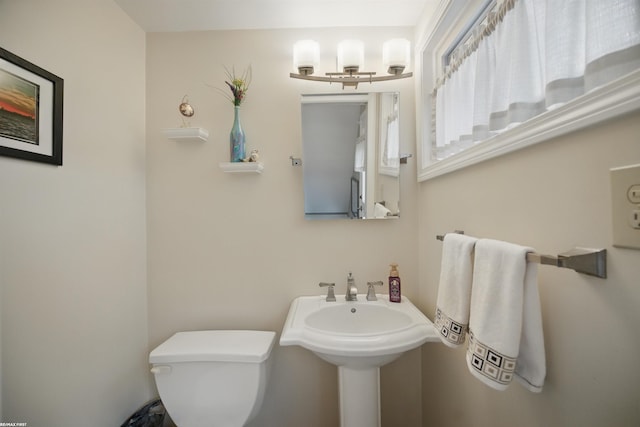 bathroom featuring toilet
