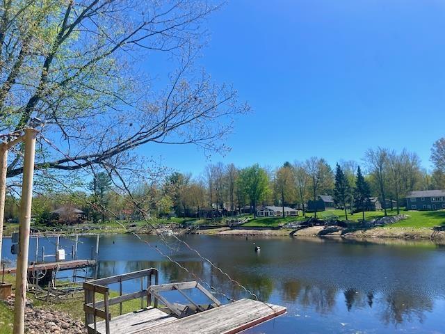 1548 Pioneer Rd, Alger, MI 48610 - dock area featuring a water view