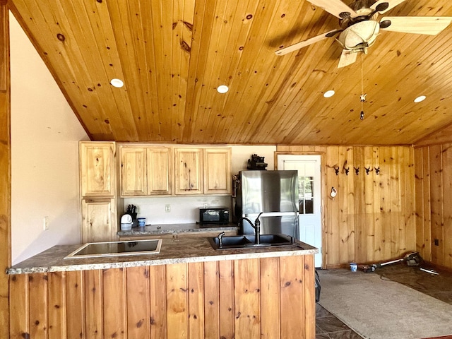 kitchen with recessed lighting, wooden ceiling, a sink, and black appliances